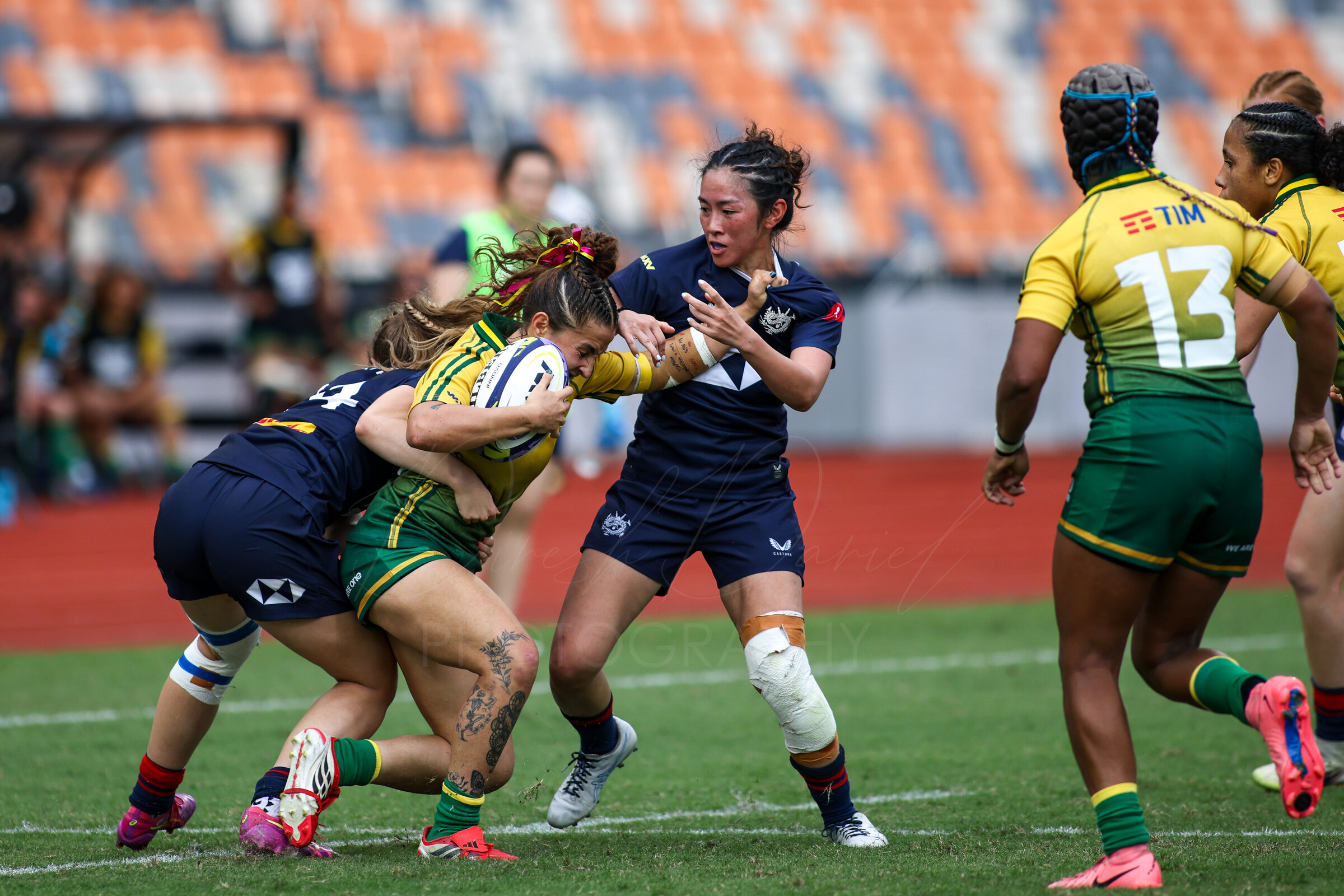 Ball carrier wrapped in a double tackle